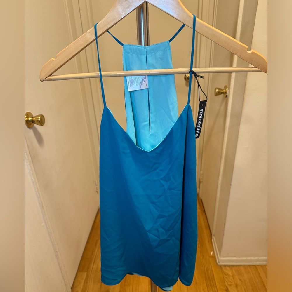 NWT Express teal and light blue reversible sleevele top. Size small